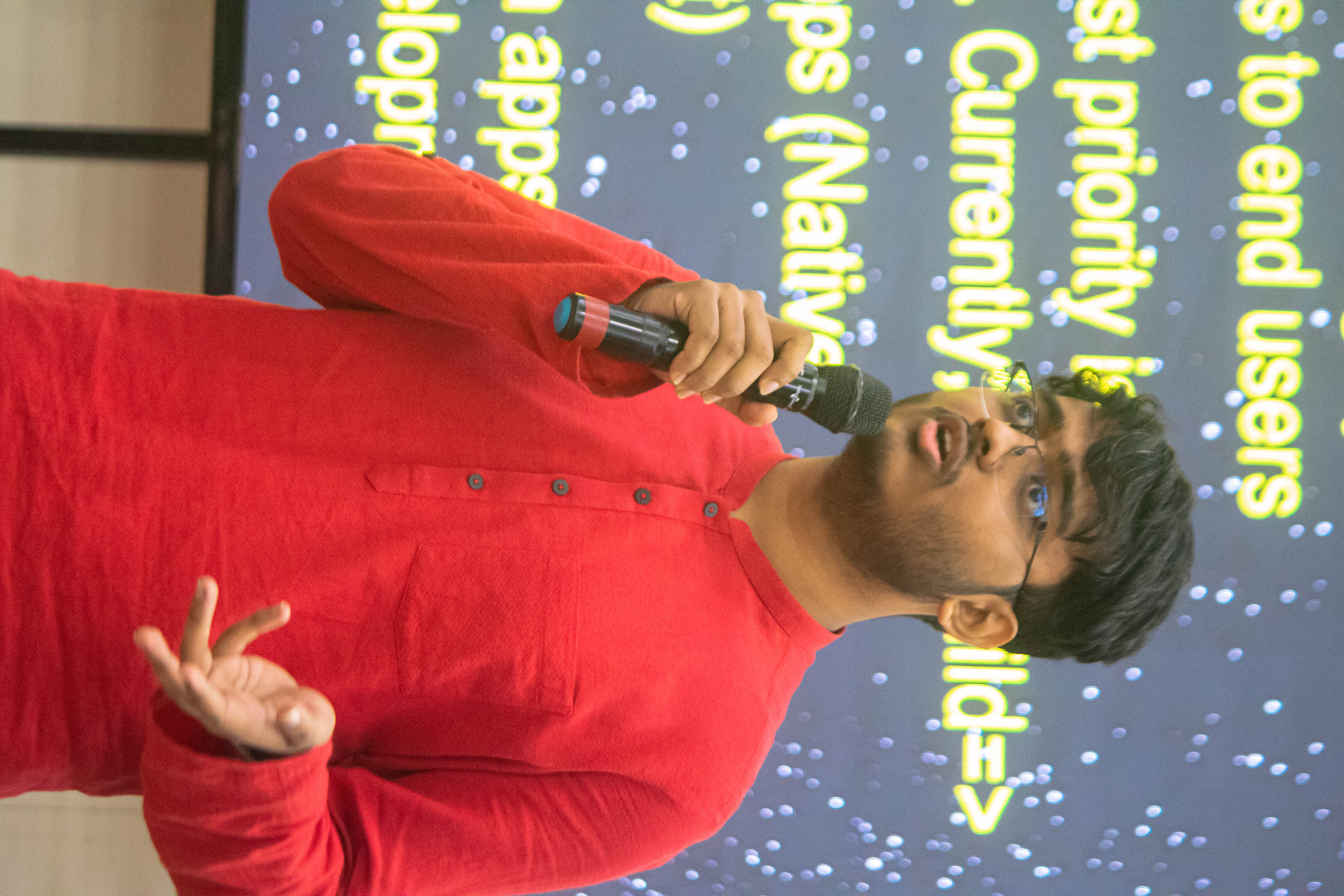 Biswadeep Dev speaking at a student event